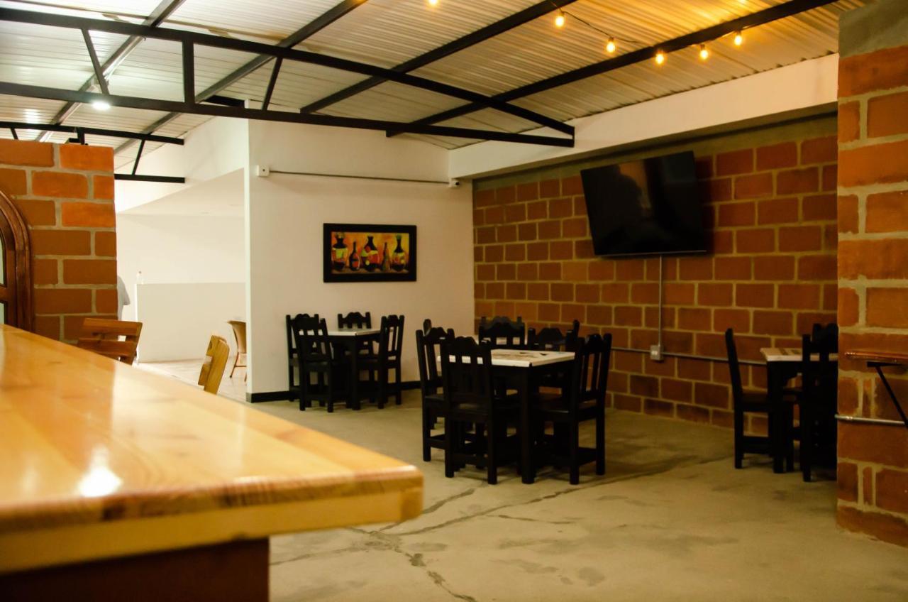 Casa Hotel Los Arboles Bello Kültér fotó