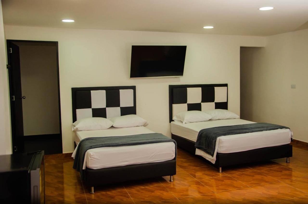 Casa Hotel Los Arboles Bello Kültér fotó